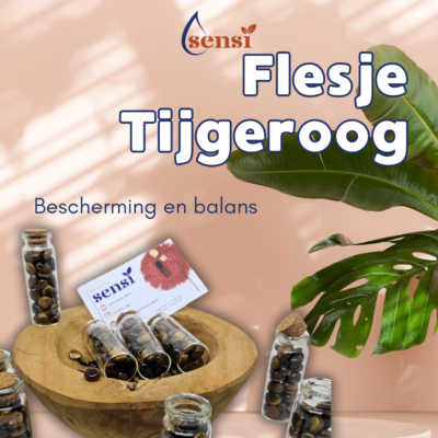 Meerdere glazen wensbuisjes gevuld met stukjes edelsteen tijgeroog.